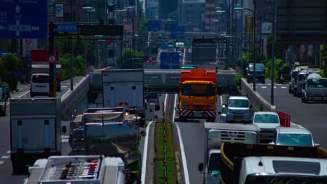 a timelapse of the traffic jam at the urban street in tokyo long shot