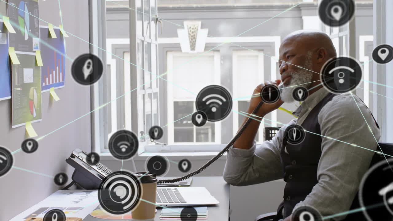 Talking on phone, businessman with network connectivity icons in office setting