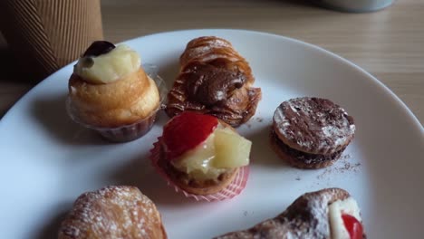 Typical-homemade-Italian-Desserts-Pastry-Slide-down-camera-on-plate