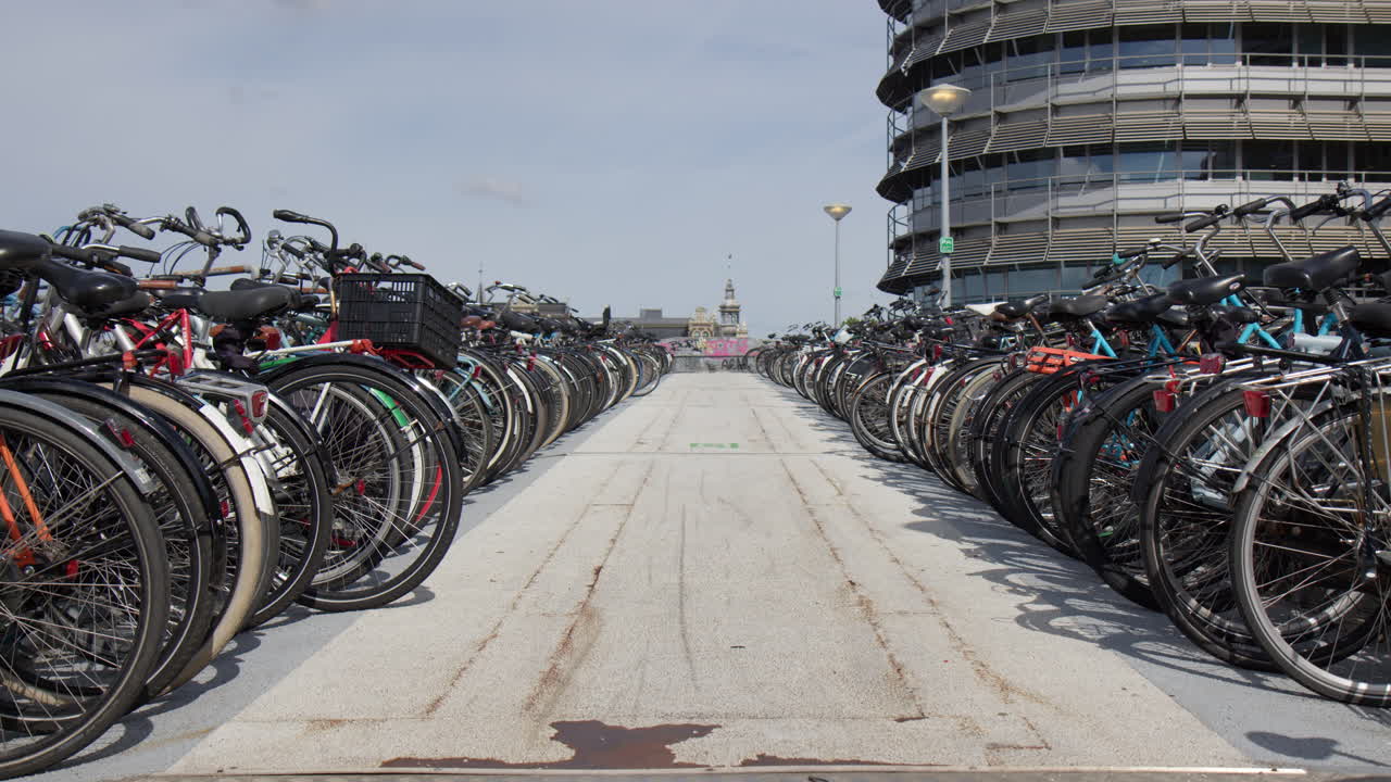Bikes At The Bike Parking Space In Amsterdam, Netherlands - Wide Shot