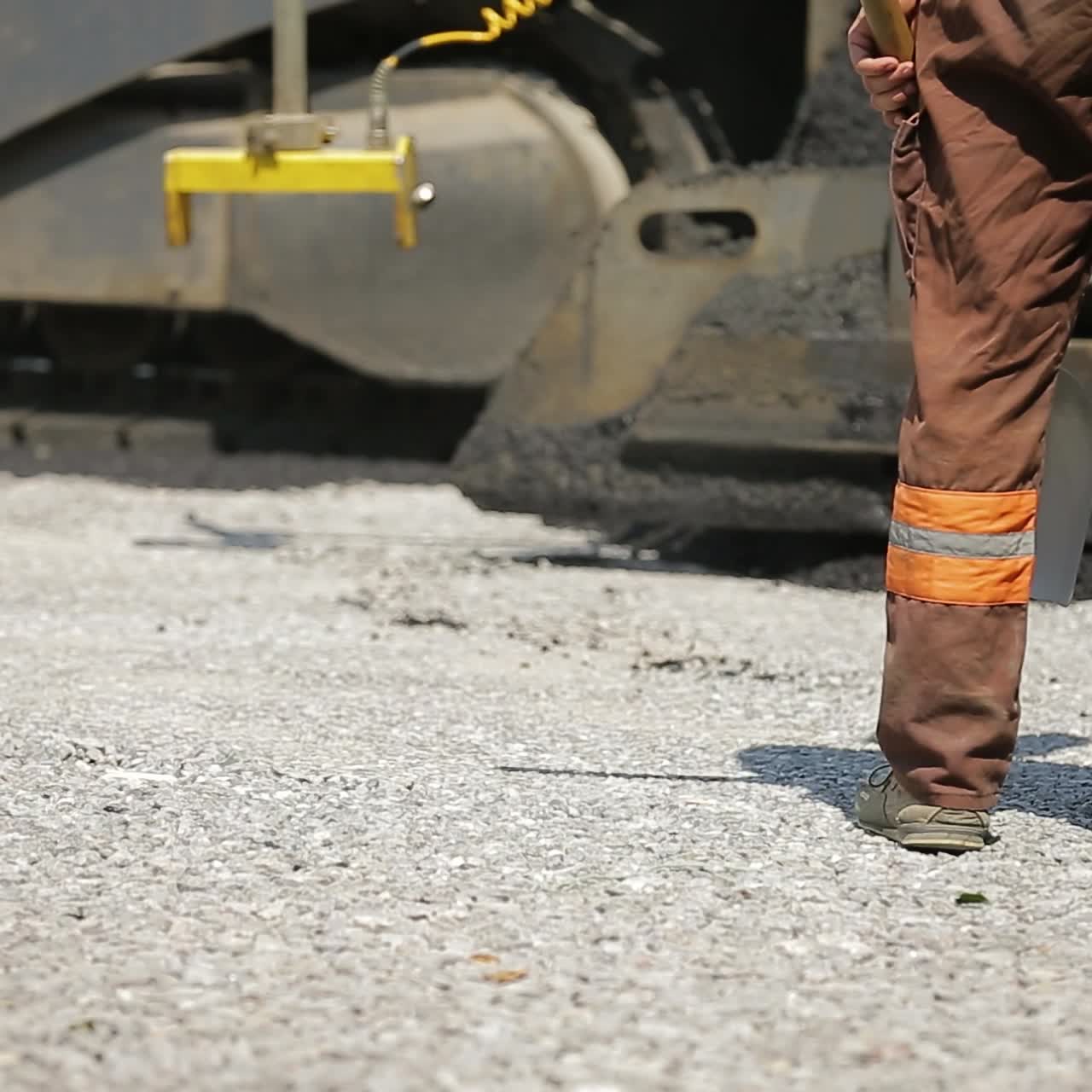 Laying Asphalt With Road Construction