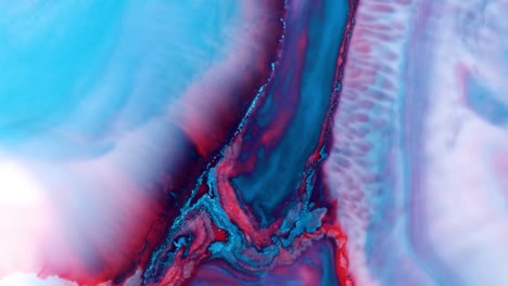 mixing acrylic paints in liquid.