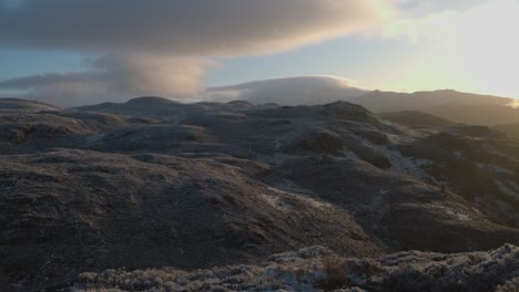 Static-shot-of-snow-capped-mountain-ridges-on-view-from-Ben-A'an-in-the-highland