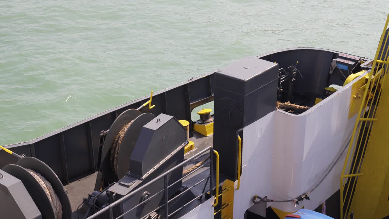 Deck of a Maritime Vessel With Winches, Ropes, and Seafaring Operations