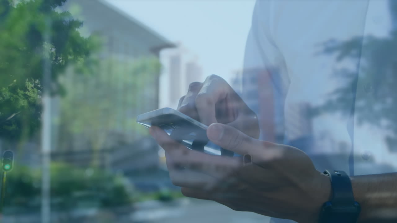 Animation of man using smartphone over cityscape