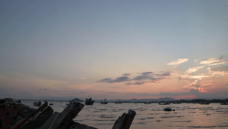 Sunset-over-a-wooden-boat,-Prachuab-Khiri-Khan,-Thailand