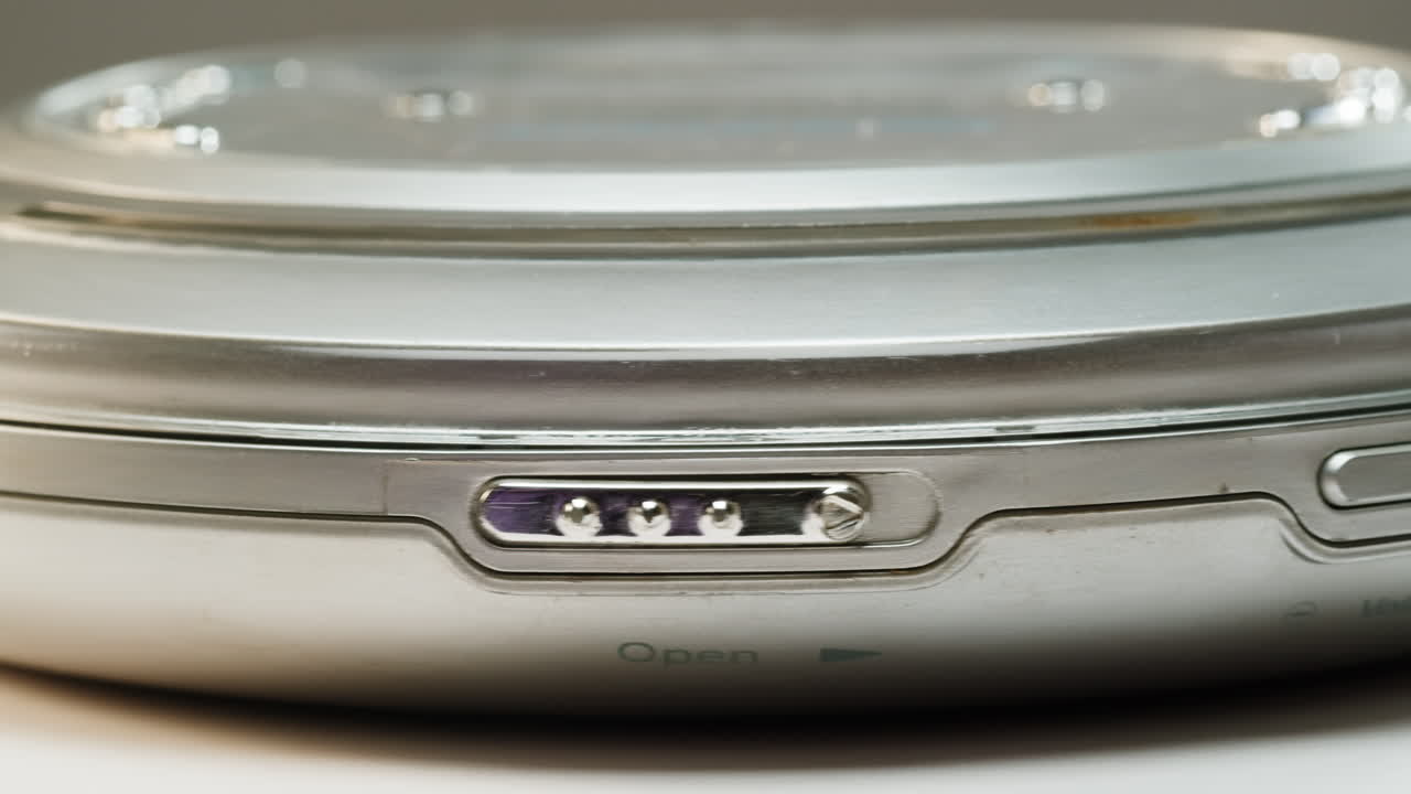 Vintage cd music player close-up. Using portable music player for listening with compact disc
