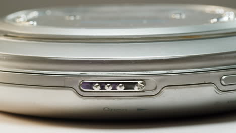 vintage cd music player close-up. using portable music player for listening with compact disc