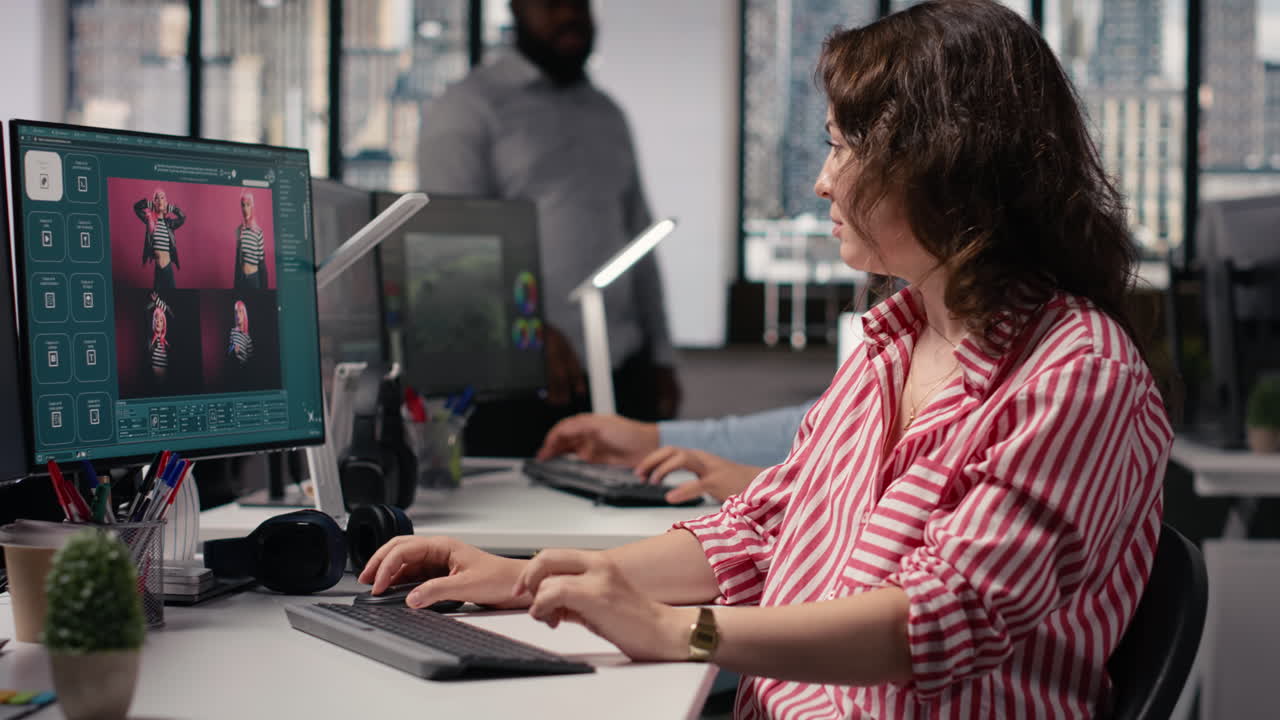Smiling Woman Working on Computer in Modern Office
