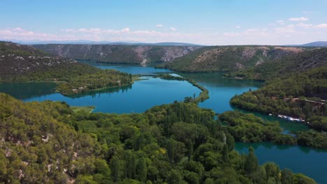 stunning aerial view flying forward across krka national park lakes and waterfalls in dalmatia, croatia filmed in 4k