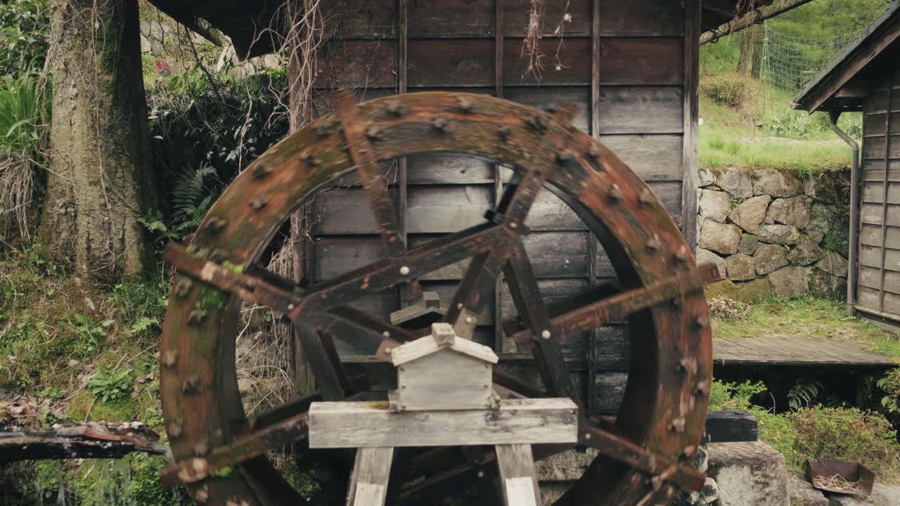 Wooden Water Wheel in a Traditional Japanese Garden