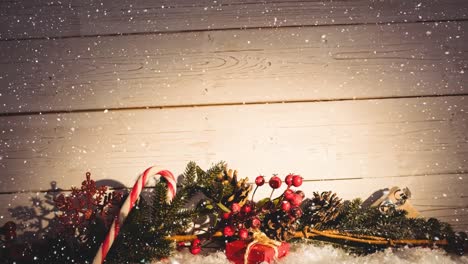 falling snow with christmas decoration on wood