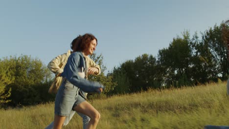 friends running through a field