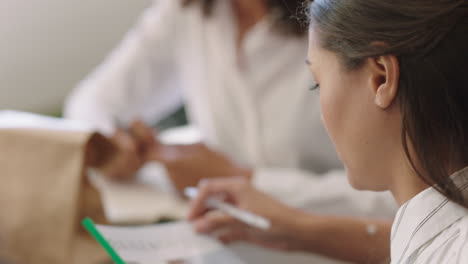 professional business woman meeting team leader talking to colleagues brainstorming creative ideas confident hispanic female manager in office boardroom close up