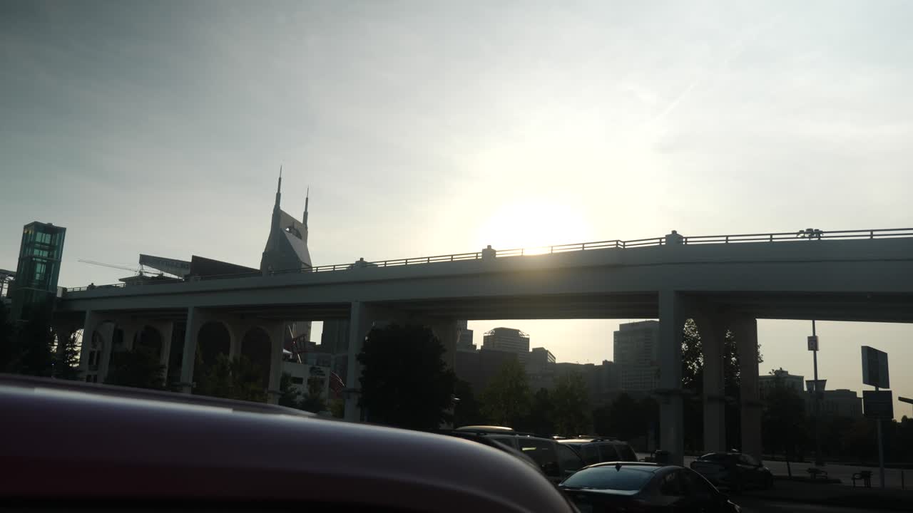 View of the Nashville downtown skyline from a parking garage near the pedestrian bridge