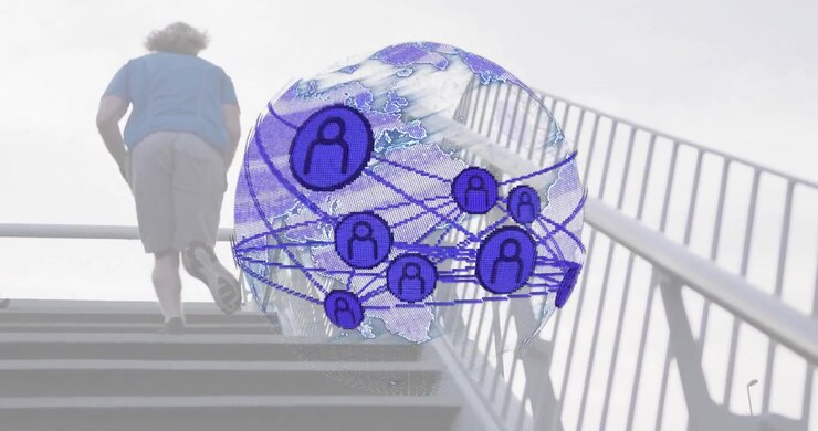 Man placing foot on stairs and climbing with rotating digital globe illustrating technology network