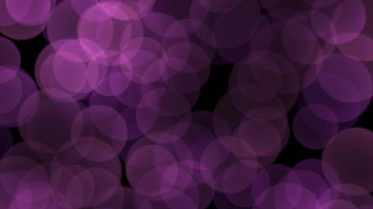 volar gran bokeh púrpura en degradado negro
