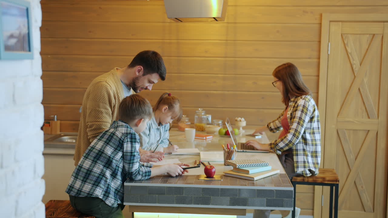 Family Doing Homework in the Kitchen