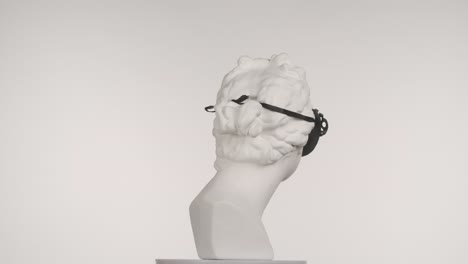 white bust with black and silver masks