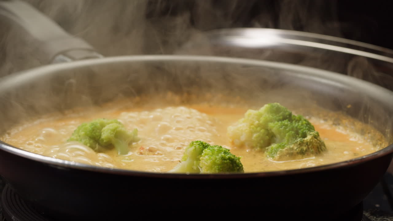 Cooking Curry Noodles with Broccoli