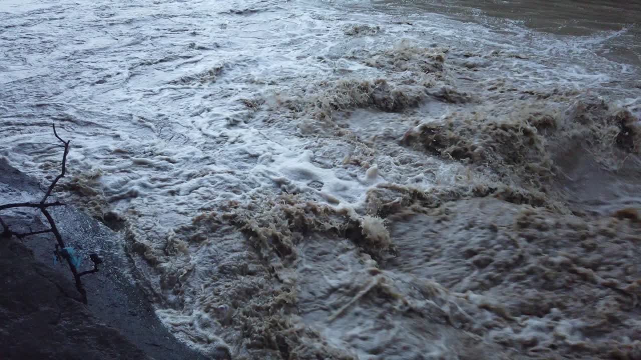 Muddy water flooding after the storm