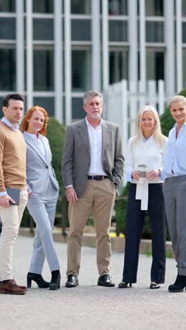 group of diverse business professionals standing outdoors