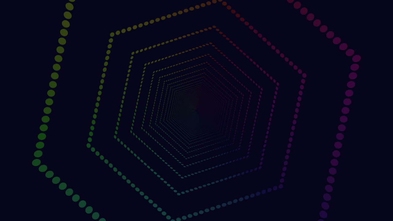 patrón hexagonal simétrico con puntos de colores sobre un fondo negro