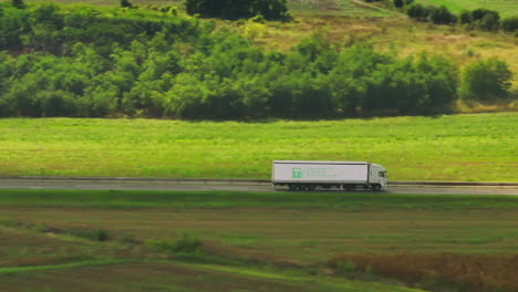 truck on highway through green landscape - zero emissions