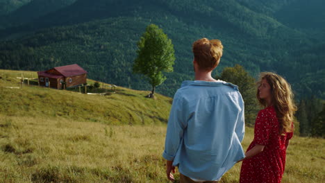 relaxed family travel mountains outdoors. lovely couple walk together at nature.