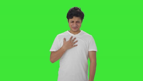 Sick-Indian-man-having-acidity-problem-Green-screen