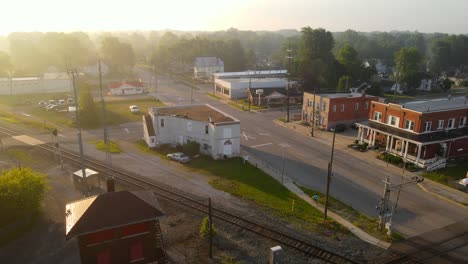 quiet morning in a rural small town in america with empty streets on golden hour sunrise