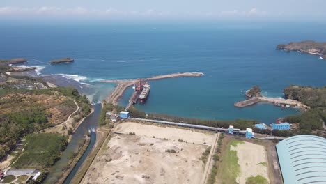 aerial view of an industrial port in the southern coastal area of ​​pacitan regency, east java, indonesia