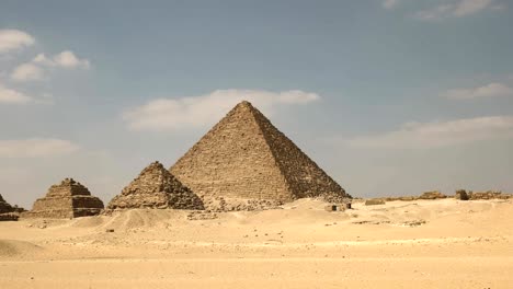 low angle pan of pyramids at giza near cairo, egypt