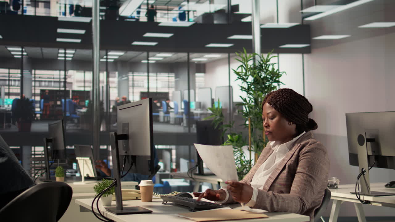 Businesswoman reviewing documents in a modern office