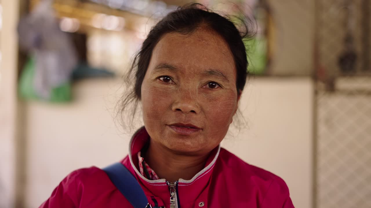 Close-up portrait of an older Asian woman
