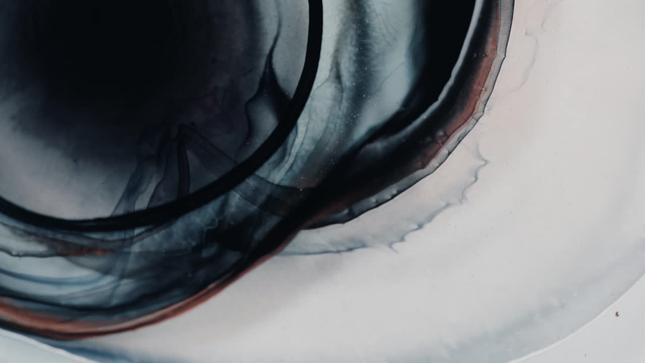 Liquid fluid forming an abstract nebula