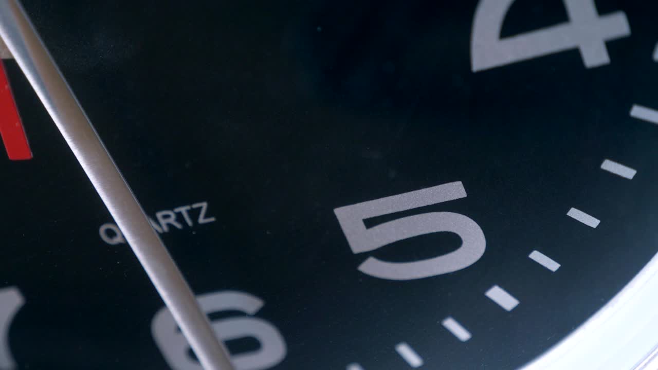Black clock running. time, measurement.Timelapse. close up