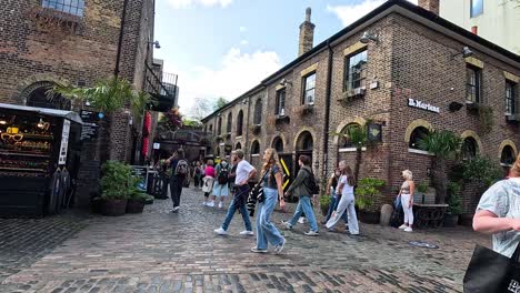 people walking and shopping in camden town