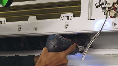 air conditioner repair in progress