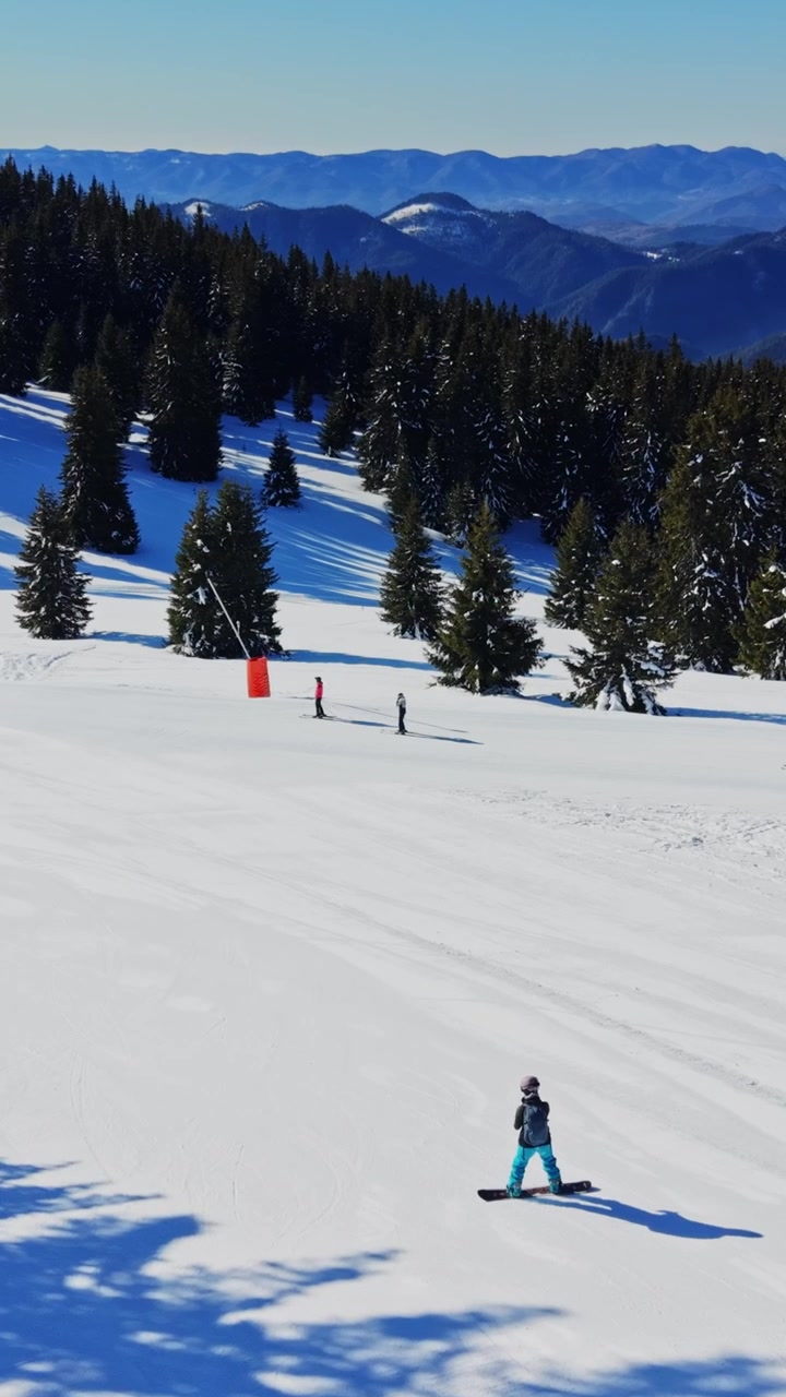Carpathians offer winter sports activity in Bulgaria during sunny day