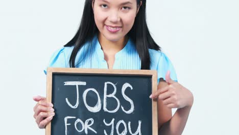 asian businesswoman showing jobs for you sign