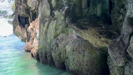 thailand island rocky limestone cliff andaman sea boat ride holiday