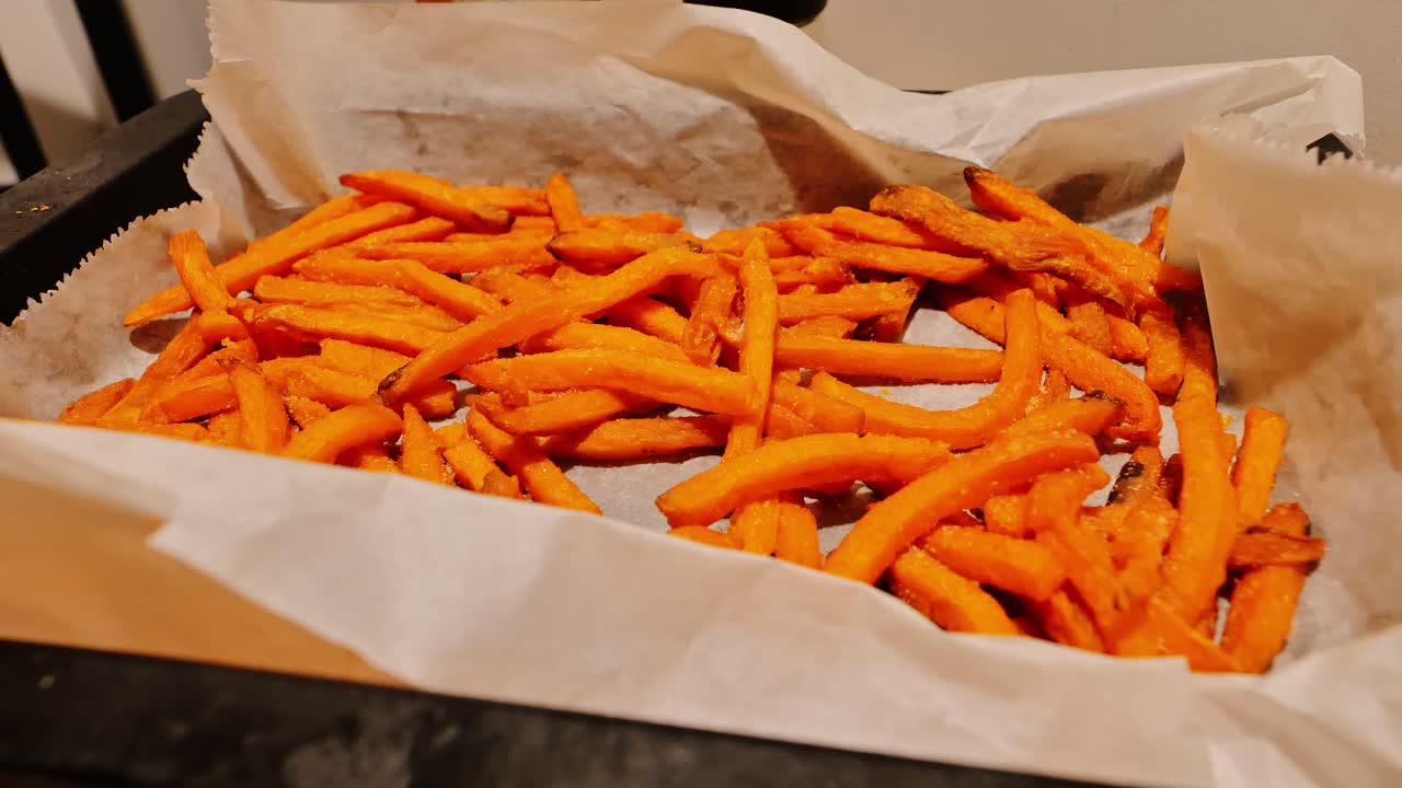 Fresh fries shot in macro focus showing texture and color of crisp surface