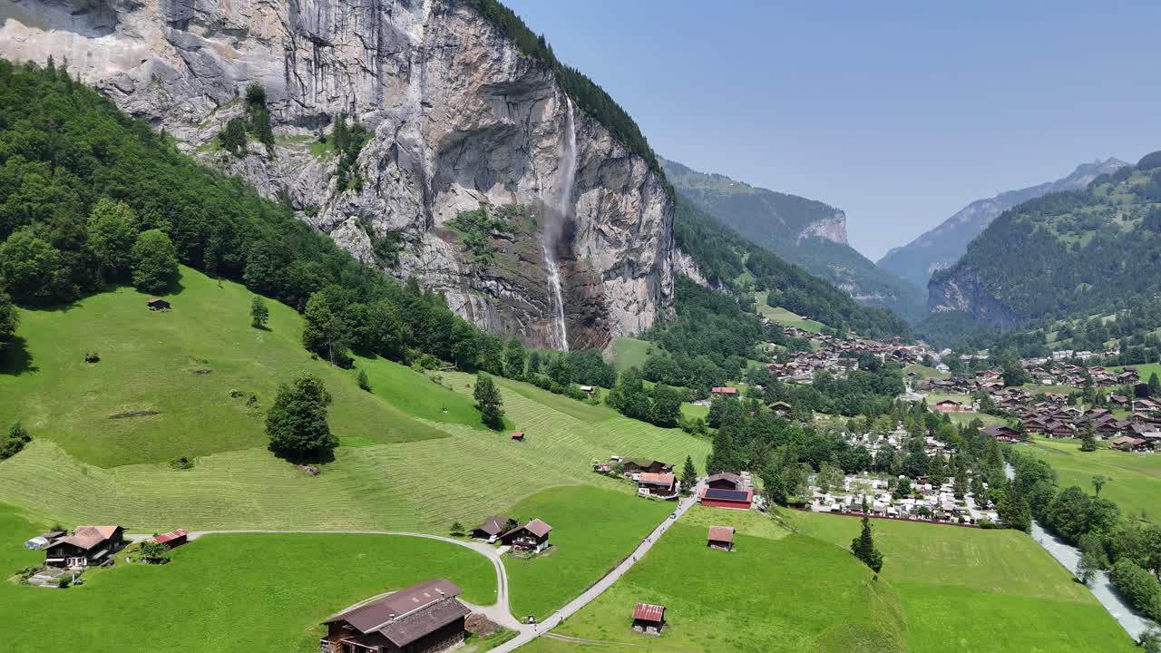 Lauterbrunnen green Valley Switzerland ascending drone,aerial