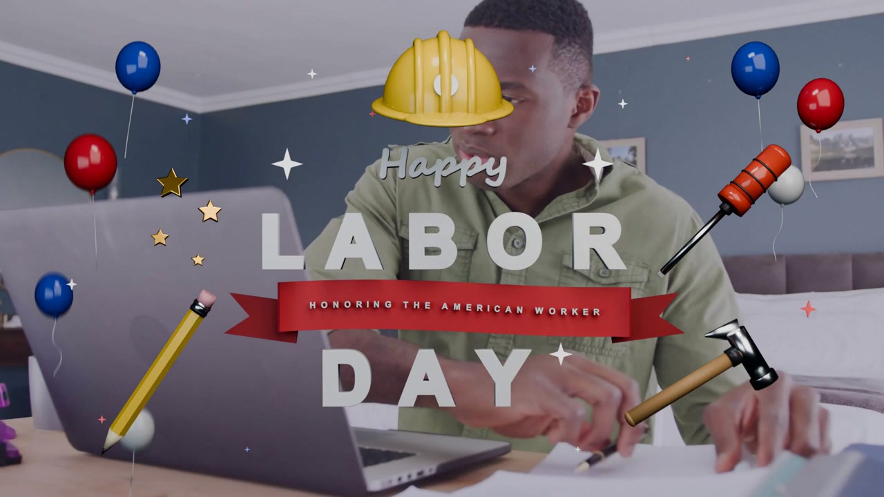 Man writing at desk with laptop, pen motion causing Labor Day graphics forming, honoring worker