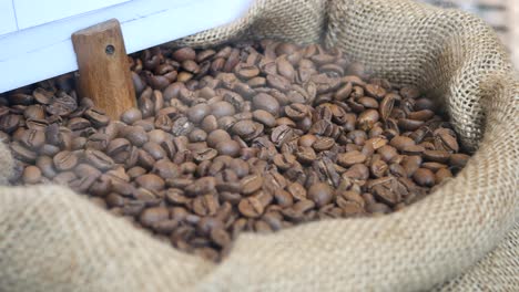 close-up of coffee beans in a burlap sack