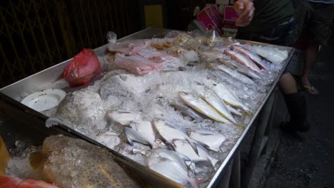 Asian-street-seafood-fish-market-fish-on-ice-for-sale-documentary-Thailand