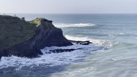 waves hitting rocks, coastal ireland