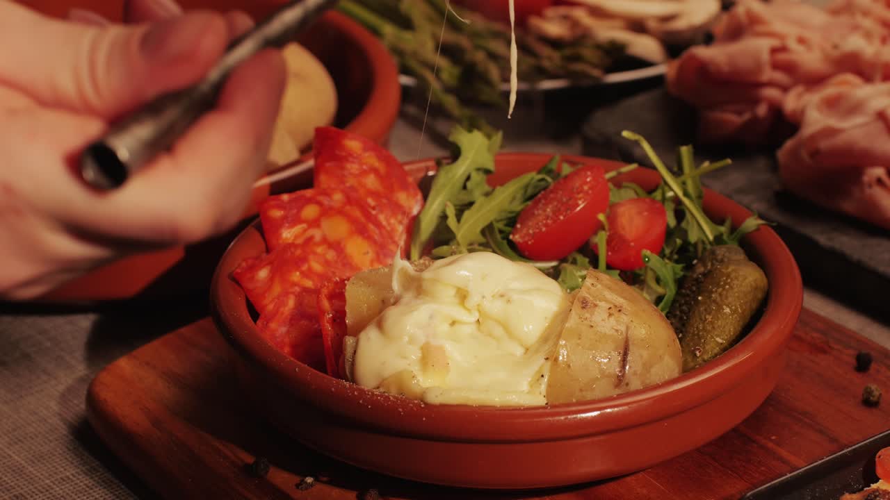 Italian or Spanish restaurant with traditional tapas food, Spanish cuisine, delicious tapas and cheese plate, bruschetta with cheese, olives dry tomatoes and tasty sandwich bar appetizer, buffet