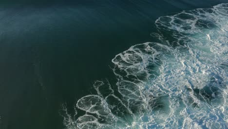 aerial top down close up perfect morning indian ocean wave breaking
